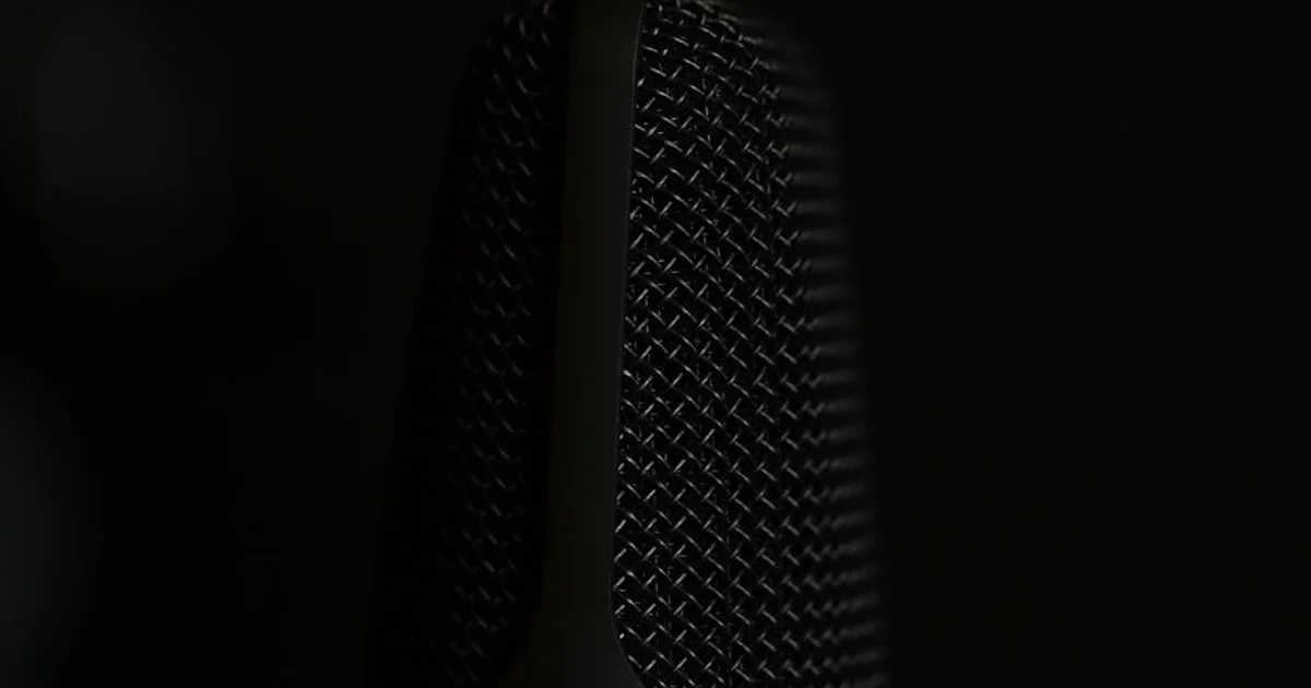 Voice actor in professional home studio recording audio for ACX submission