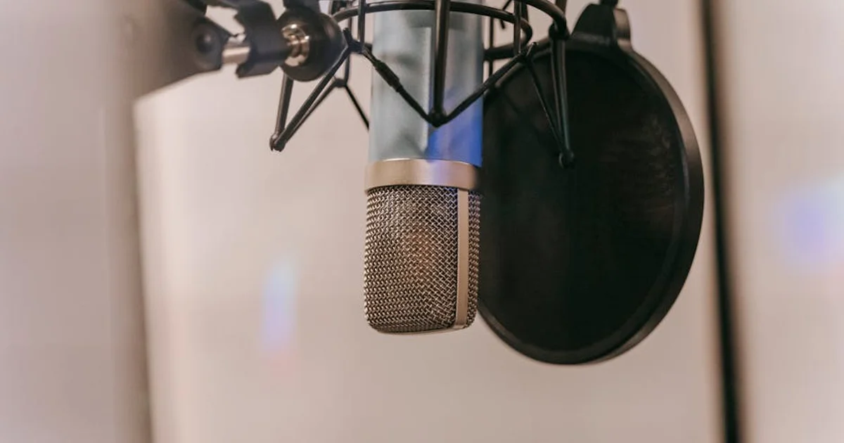 Voice actor in professional home studio recording audio for ACX submission