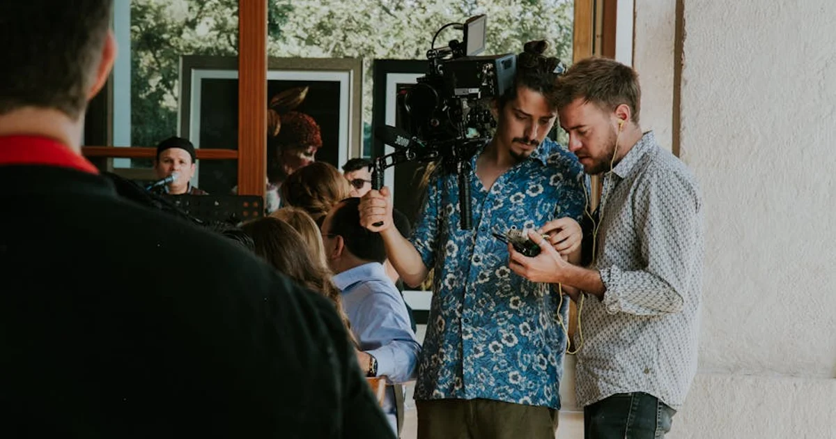 A professional Nigerian voice actor wearing headphones, speaking into a studio microphone, with soundproofing panels visible in the background, conveying focus and expertise during a documentary narration session.