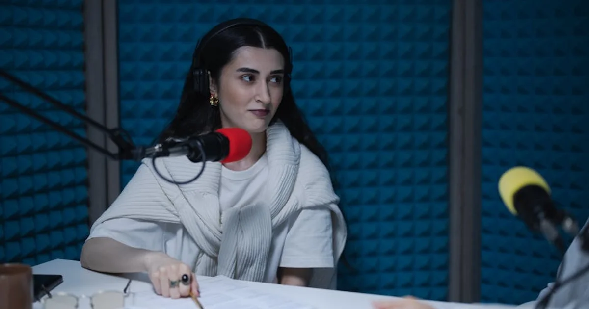 Nigerian voice actor in a professional recording studio with a microphone