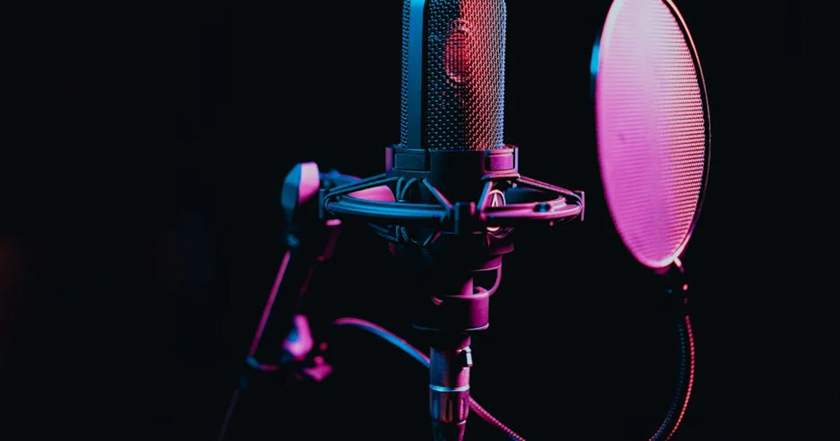 Professional Nigerian voice actor in a recording studio with a microphone